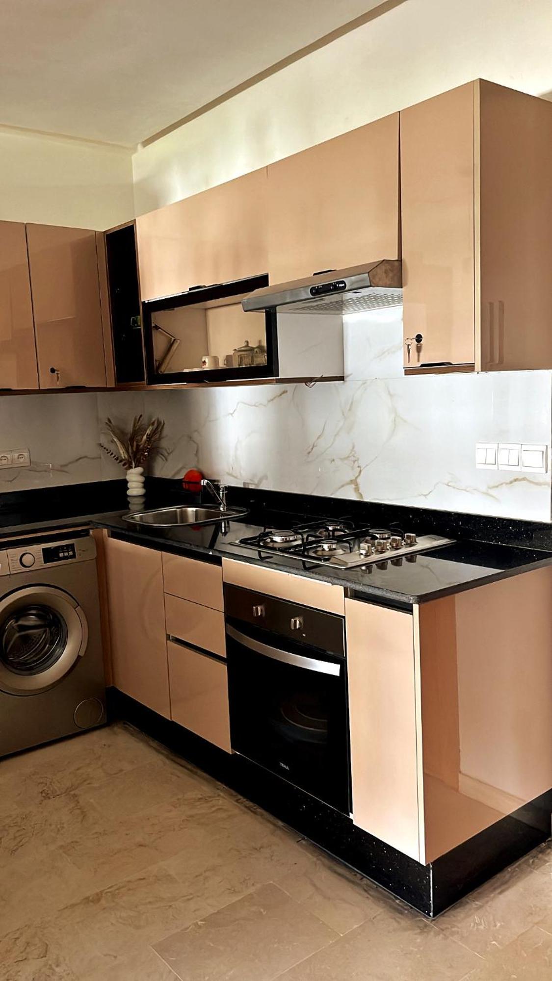 Elegant Appartement Avec Un Acces Piscine Jardin Parking Sous-Sol Et Wifi Haut Debit Fibre Optique Tanger Eksteriør billede